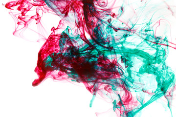 Red and green ink in water