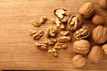 Walnut on a cutting board made of oak/ Walnut on a cutting board made of oak
