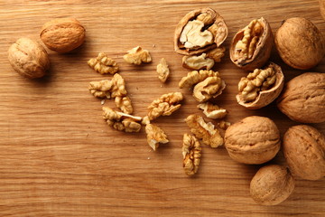 Walnut on a cutting board made of oak/ Walnut on a cutting board made of oak