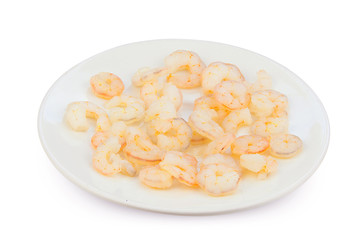 delicious appetizing prawns on white plate on white