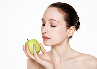 Beautiful fitness women holding healthy apple