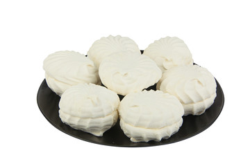 Delicious white vanilla marshmallow on plate on white