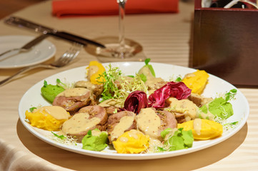 Meat rolls with mustard seeds on the restaurant table