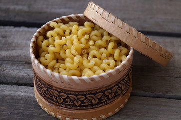 Raw pasta spirals in a jar