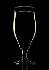 Glass of beer cider with yellow lines on black