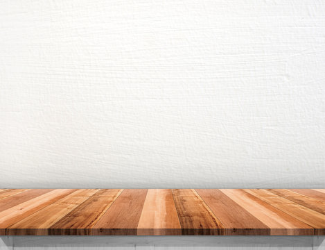 Empty brown wood table top with white concrete wall,Mock up for