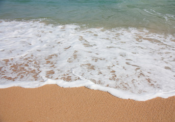 Fototapeta na wymiar Wave and sand background
