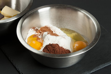 Cooking Process Of Brownies. Ingredients In Bowl.