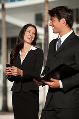 Businessman and Businesswoman Hotel Airport