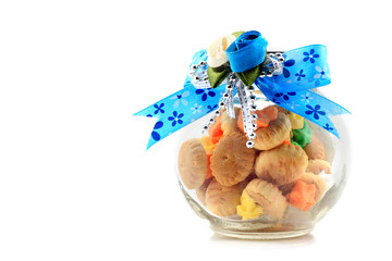 Meringue Button Cookies in the bottle with blue ribbon for gift
