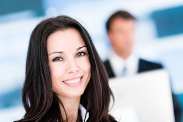 Fototapeta premium Businesswoman and Businessman in Office