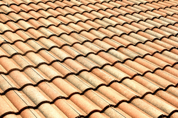 Red tiles roof background