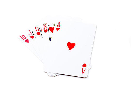A royal straight flush playing cards poker hand in hearts.