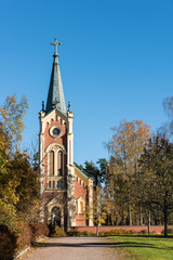 Fototapeta na wymiar Neo-Gothic style old small church on a sunny day