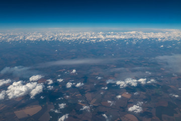 The high altitude view on the land. View from the plane. Wide angle