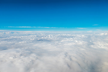Fototapeta na wymiar The blue sky on the background of cloud stream. Wide angle
