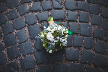 wedding bouquet on the paving stones