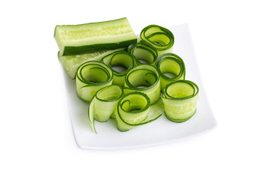 Cucumber and slices isolated on white background