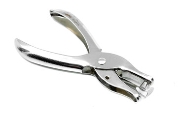 Silver metallic hole puncher on white background