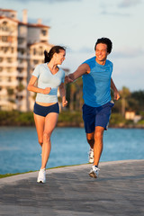 Young Couple Man and Woman Running Morning