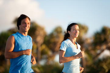 Young Couple Man and Woman Running Morning