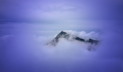 Beautiful landscape with Kitzbuhel mountain peak in the mist, Tirol, Austria