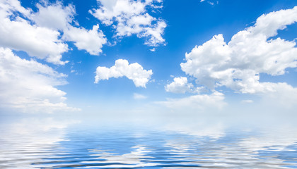 sea and cloudy blue sky