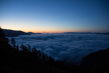 Sunrise On The Way To Gmeineck 2.592m With Clouds Above The Valley In Autumn In Carinthia Austria