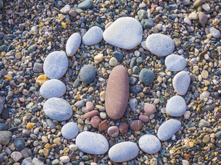 Stone smile face on beach