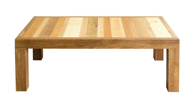 Coffee table with top made of different wood types. White background, isolated