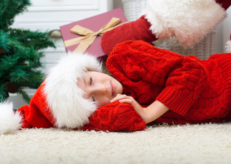 Santa Claus delivering presents while kids are sleeping.