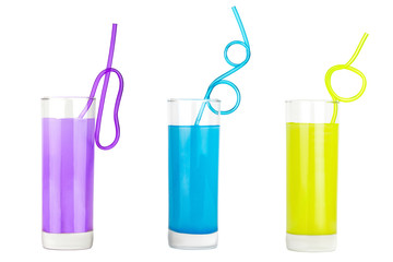 Colorful set of  glasses with juice and straw