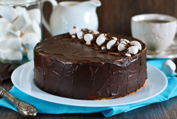 Homemade cake with vanilla mousse and chocolate 