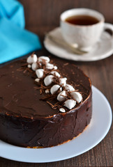 Homemade cake with vanilla mousse and chocolate 