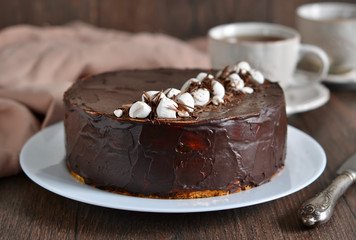 Homemade cake with vanilla mousse and chocolate 
