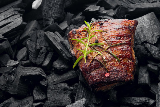 Beef Steak On The Charcoal. Product Photo, Place For Your Advertisment