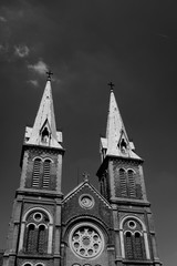 Fototapeta na wymiar Saigon Notre Dame Cathedral Basilica in Ho Chi Minh city, Vietnam. Asia. Shoot in black and white shot with morning light and beautiful clear sky.