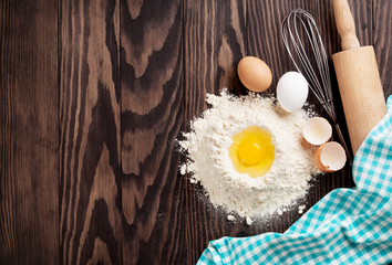 Kitchen table with utensils and ingredients