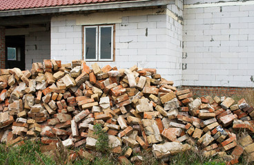 Renovated old house. Dismantling of old brick