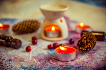 Obraz na płótnie Canvas Candles and aromatherapy lamp