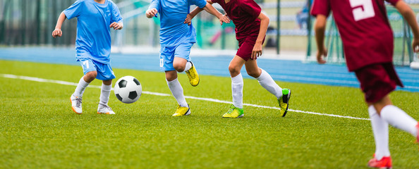 Football Soccer Game For Kids. School Soccer League. Competition Between Two Youth Football Teams.