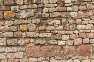 Naklejka premium Stone wall made out of single bricks