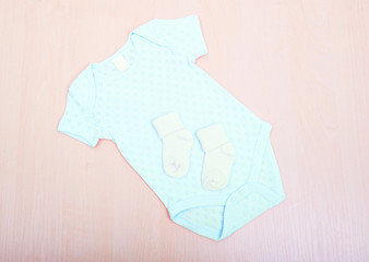 Baby goods. Baby blue blouse and pants sliders pijama, body