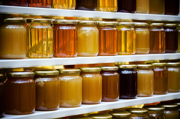 honey jars on a shelf