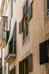 Shutters on Plaster Wall