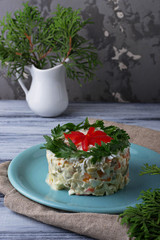 Festive salad decorated parsley and flower of pepper