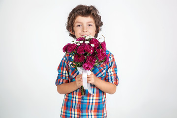 boy with a bouquet of flowers © svitlychnaja