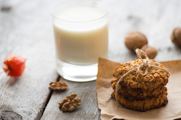Homemade oatmeal cookie served with cup of milk