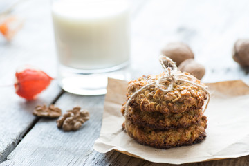 Homemade oatmeal cookie served with cup of milk