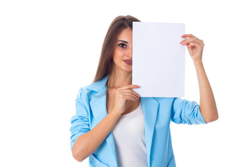 Woman holding white sheet of paper